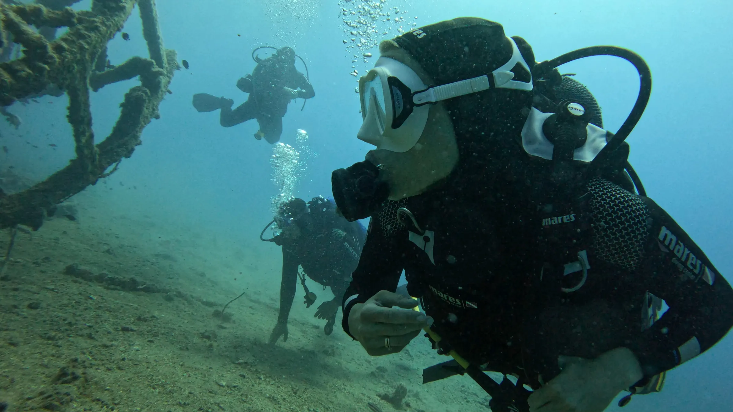 Two divers exploring a shipwreck near Split